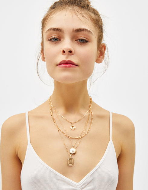 Multi-strand chain necklace with medallion