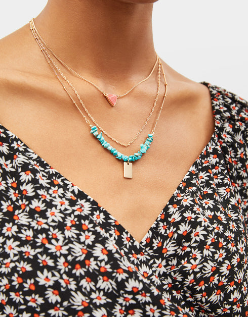 Set of necklaces with stone motifs