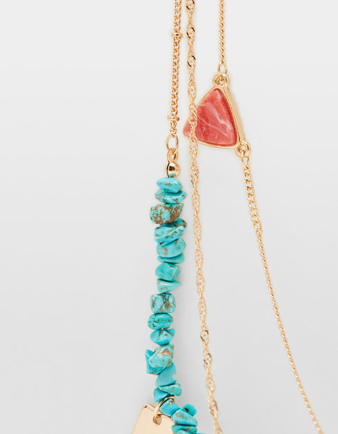 Set of necklaces with stone motifs